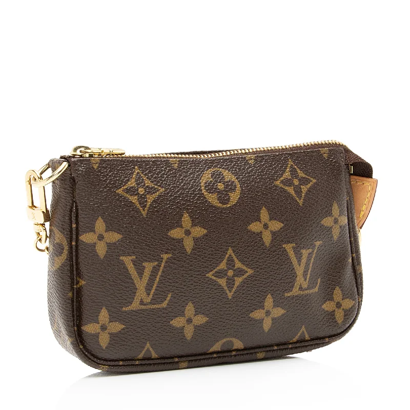 Louis Vuitton Twist bags with a contrast - colored interior for visual interestLouis Vuitton Monogram Canvas Mini Pochette Accessoires (23864)