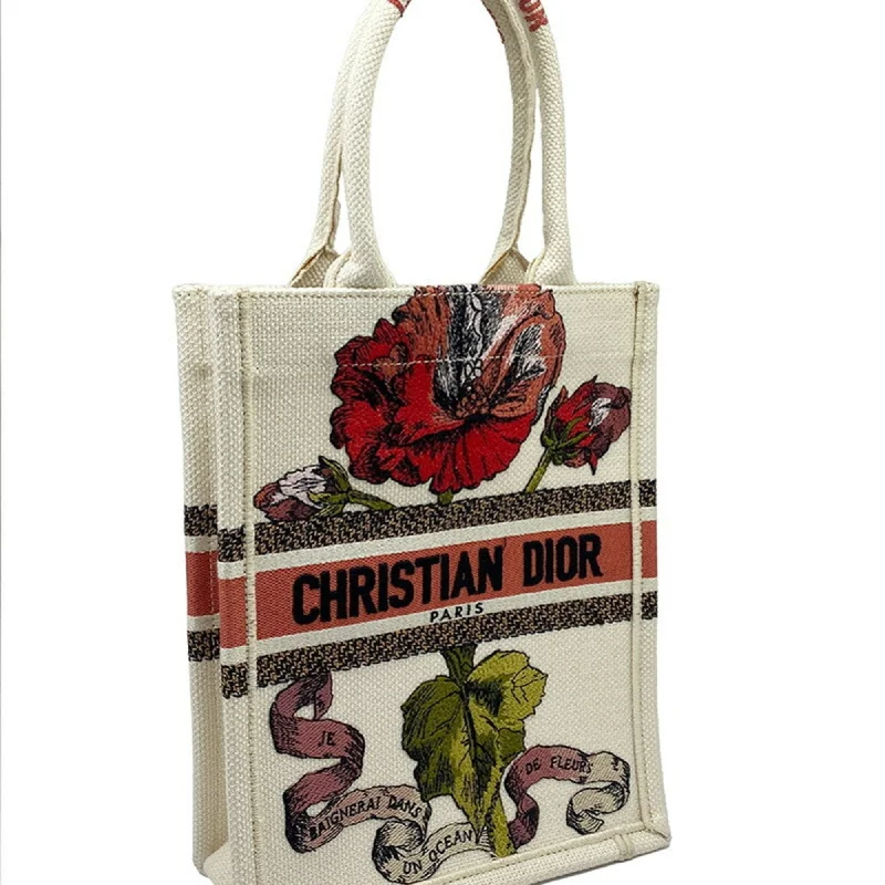 Christian Dior bags with a side - pocket for holding a water bottleCHRISTIAN DIOR Book Tote Small Vertical Canvas Flower Multicolor Beige Bag