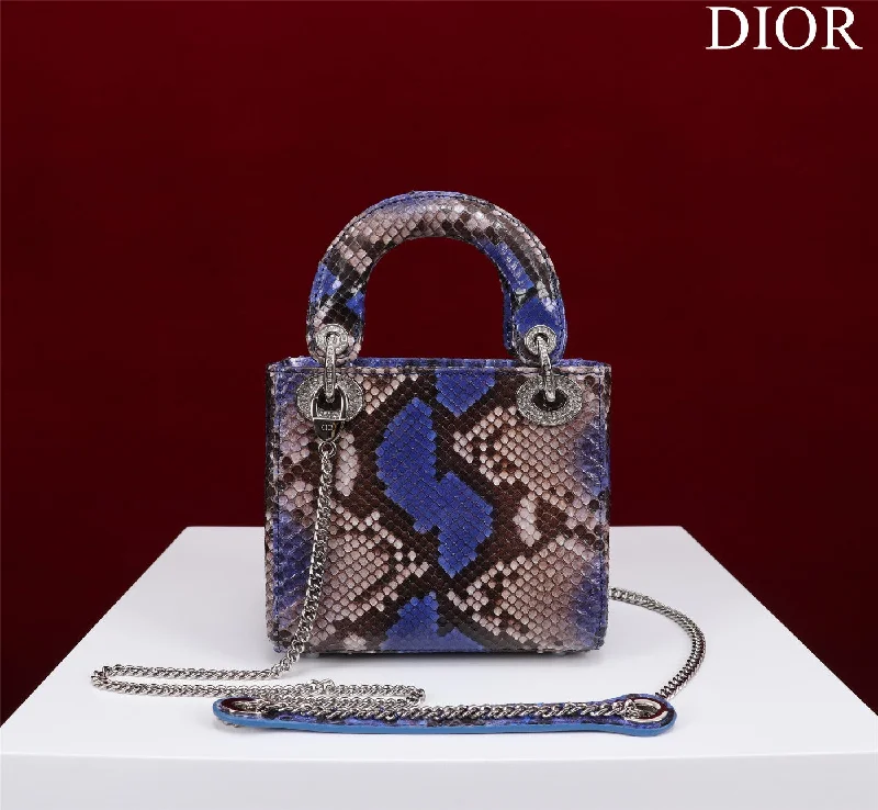 Christian Dior handbags with a snap - button closure and a decorative buckleChristian Dior - Luxury Bags  186