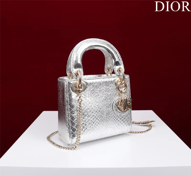 Christian Dior handbags with a snap - button closure and a decorative buckleChristian Dior - Luxury Bags  194